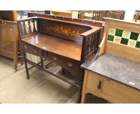 A MAHOGANY ART NOUVEAU WASH STAND WITH MARQUETRY INLAY TO THE BACK PANEL AND TWO DRAWERS 