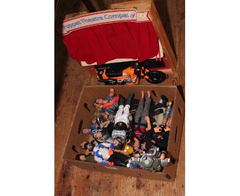 Box of Action Man and other figures, and puppet theatre stage.