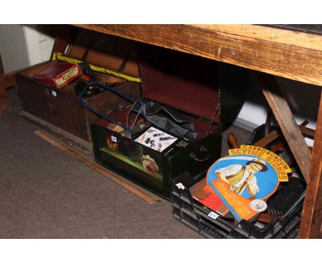 Three boxes of tools including levels, saws and tool auction catalogues.