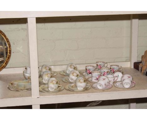 Crown Staffordshire coffee cans and saucers, two Shelley cups and saucers and half tea service with rose decoration.