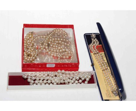 Collection of simulated pearl necklaces and boxed bracelet.