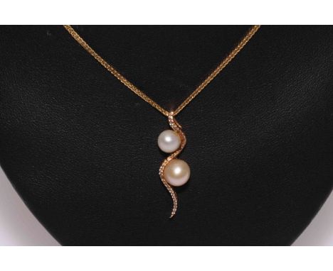 9 carat gold two pearl pendant and chain necklace.