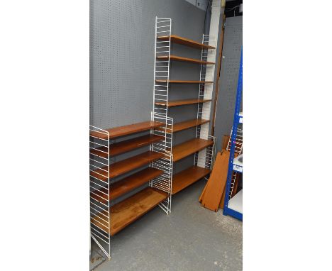 NISSE STRINNING for STRING, SWEDEN, Bokhyllan ''The Ladder Shelf'' Shelving System, C. 1960s, four sets of hanging wall shelv