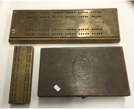 Two brass mounted cribbage boards together with draughts. Est. £20 - £30.