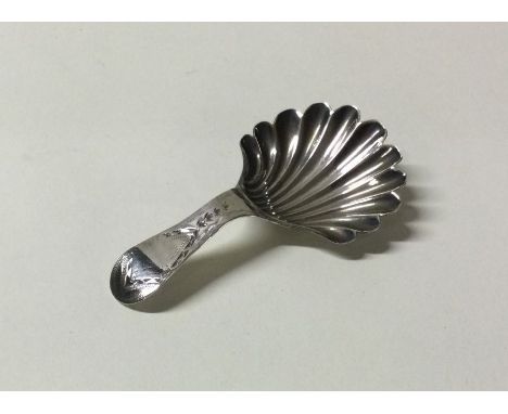 HESTER BATEMAN: A bright cut silver caddy spoon. London 1788. Approx. 7 grams. Est. £60 - £80.