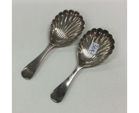 A pair of OE pattern silver caddy spoons with fluted bowls. London. Approx. 20 grams. Est. £20 - £30.