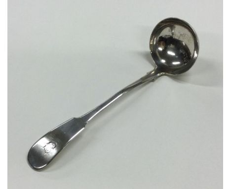 A Scottish Provincial fiddle pattern silver ladle. Punched, 'TS'. Approx. 30 grams. Est. £70 - £80.