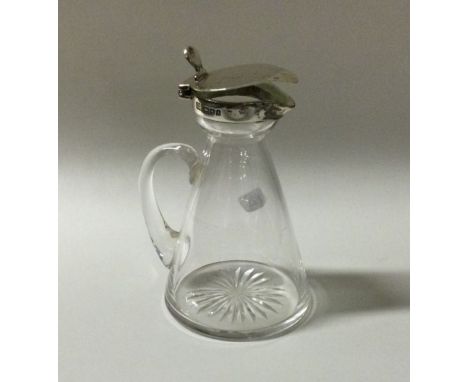 A tapering silver whisky noggin / tot. London 1904. By Hukin &amp; Heath. Est. £80 - £120.