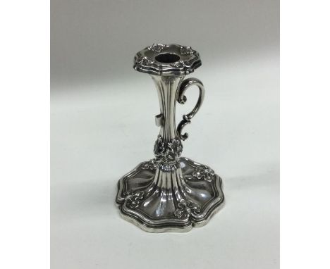 A Victorian silver chamber stick with leaf decoration. Sheffield. By Henry Wilkinson. Approx. 83 grams. Est. £100 - £150.