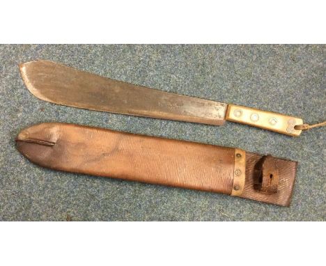 A large Continental knife in leather scabbard. Est. £20 - £30.