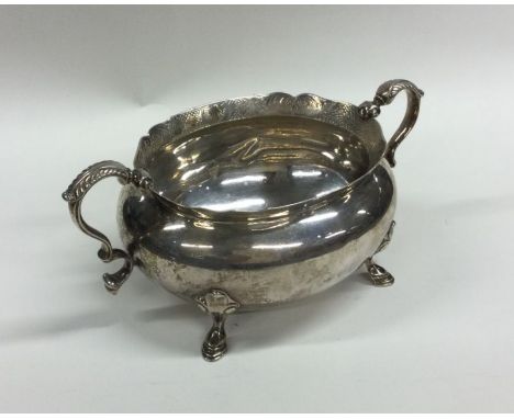 EDINBURGH: A Scottish silver sugar basin with bright cut border. Approx. 291 grams. Est. E100 - £150.