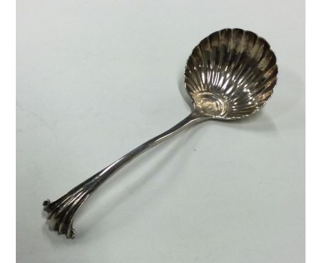 A silver onslow pattern ladle with fluted bowl. London 1823. By Clement Cheese. Approx. 48 grams. Est. £30 - £50.