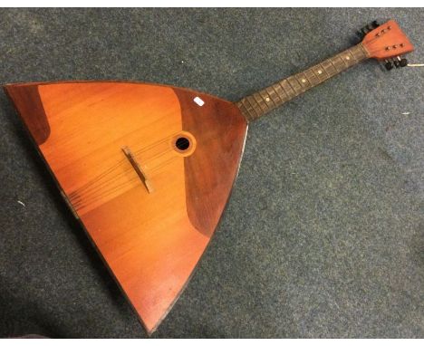 An old balalaika. Est. £30 - £50.
