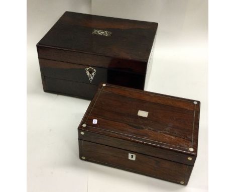 A hinged top rosewood caddy together with one other. Est. £30 - £50.