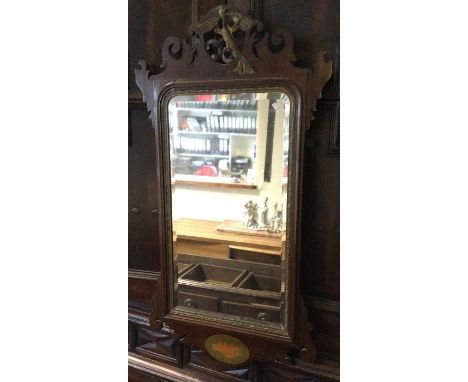 A good mahogany framed mirror with eagle finial. Est. £15 - £20.
