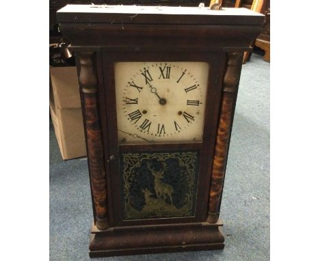 An old mahogany cased wall clock. Est. £30 - £50.
