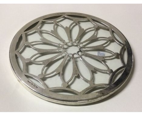 A silver and glass mounted teapot stand. Birmingham. By D&amp;B. Est. £20 - £30.