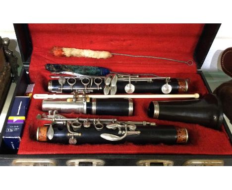 A cased Boosey &amp; Hawkes clarinet. Est. £30 - £50.