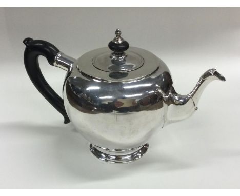A heavy Russian silver bullet shaped teapot of plain form. Marked to base. 1752. Approx. 392 grams. Est. £1000 - £1500.