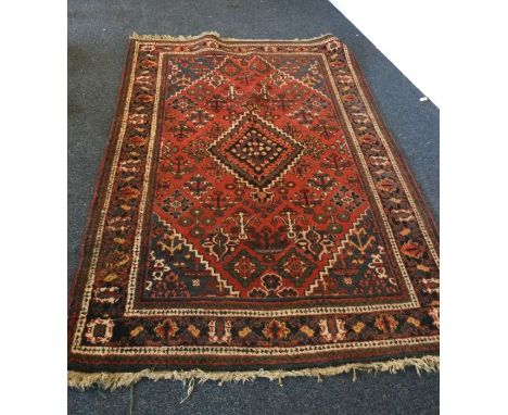 A large old tapestry rug. Est. £30 - £50.