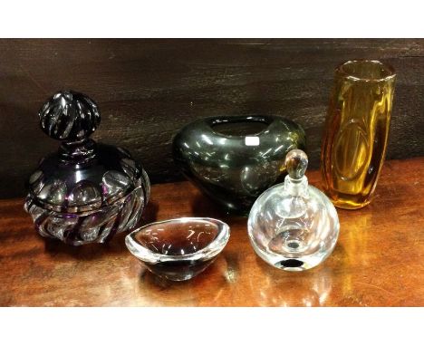 An attractive amethyst glass bowl and cover together with an Orrefors glass scent bottle etc. Est. £10 - £20.