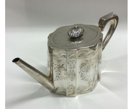 A Victorian silver teapot attractively decorated with flowers and leaves. London 1876. By Elkington &amp; Co. Approx. 600 gra