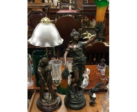 A large modern lamp in the form of a canoodling couple, together with another lamp in the form of a lady in sweeping dress. E