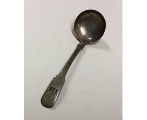 SCOTTISH PROVINCIAL: A fiddle pattern silver sauce ladle with crested terminal. Approx. 32 grams. Est. £30 - £50.