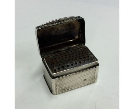 A large George III engine turned silver nutmeg grater of typical form. London 1887. Approx. 41 grams. Est. £300 - £400.
