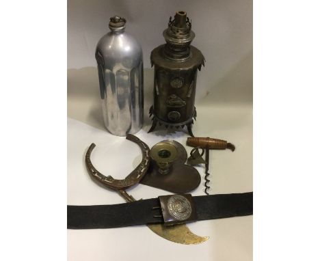 An old trench art oil lamp together with a First World War German belt etc. Est. £30 - £50.