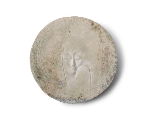 A modern Spanish ceramic wall plaque, of circular form, with bas relief head of a woman. 43cm diameter (17'') Provenance: Wit