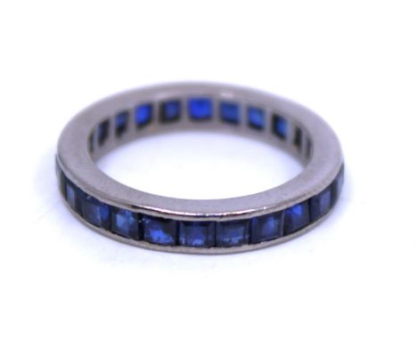 Unmarked White Metal Princess Cut Sapphire Full Eternity Ring.  The Ring contains approx. Twenty-four Princess Cut Sapphires 