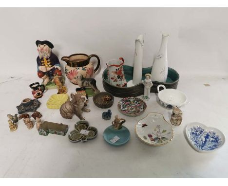 A quantity of ceramics to include; a Beswick Koala, a Wade Old English Sheepdog, A toby jug, a Japanese jug, a Beswick plante
