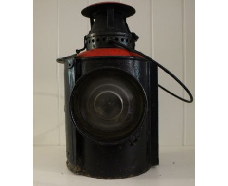 Vintage railway kerosene light with lens.