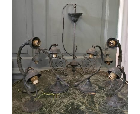 Three pairs of Arts and Crafts wall lights and a two branch celling pendant light.