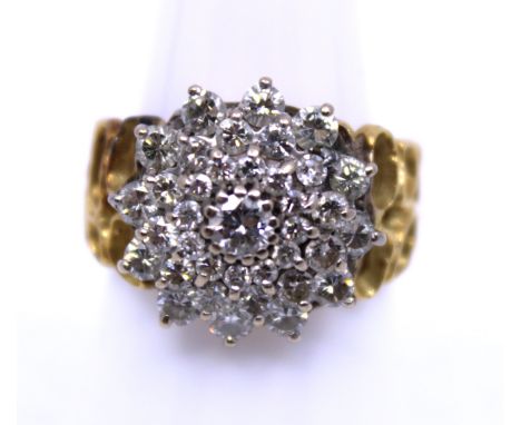 18ct Yellow Gold Approx. 1.64ct Total Diamond Cluster Ring The Ring is Unmarked. But has tested as 18ct Gold. The Ring contai