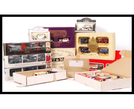 A collection of assorted Lledo scale diecast model vehicle boxed special sets to include; The Coca-Cola vehicle collection, R