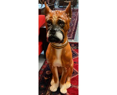 Large ceramic study of a seated boxer dog, with painted features. Unmarked. 104cm high approx. Possibly Italian, modern. (B.P