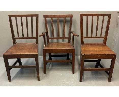 Set of six early 19th Century oak farmhouse stick back chairs to include: one carver chair. (5+1) (6)(B.P. 21% + VAT) 