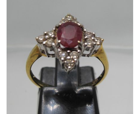 18ct gold ruby and diamond ring.  Ring size N&1/2.  Approx weight 3.4 grams.(B.P. 21% + VAT) 
