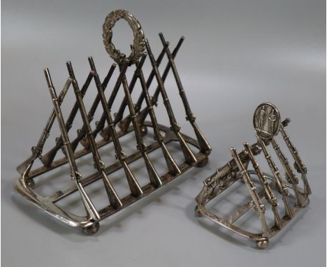 Silver shooting trophy four division toast rack, the divisions in the form of Lee Enfield rifles, having a figural mount mark