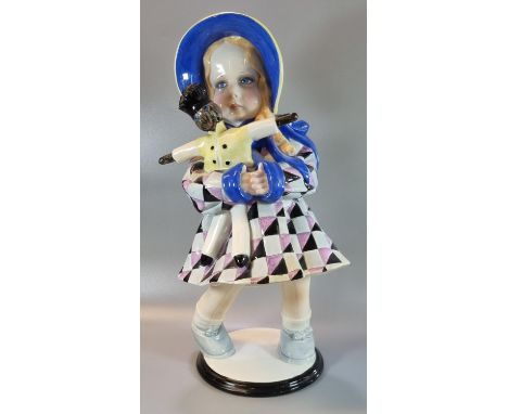 Large Art Deco Lenci ceramic figure, modelled as a girl wearing a bonnet hat with chequered dress, holding a doll. Signed to 