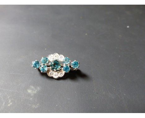 An Art Deco diamond and blue zircon bar brooch.
