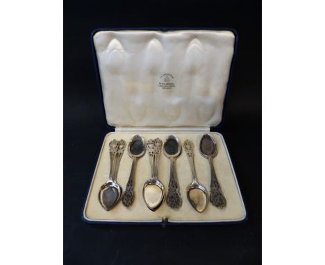 An oak cased set of twelve silver tea knives and forks with mother of pearl handles. London 1886. Maker Edward Hutton togethe