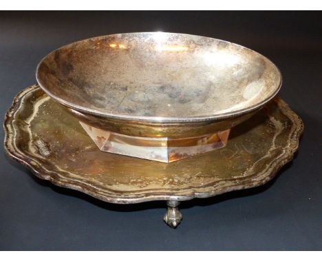 A silver salver on three scrolled feet. Sheffield 1959. 27ozs together with a Swedish 900 standard fruit bowl on octagonal pe