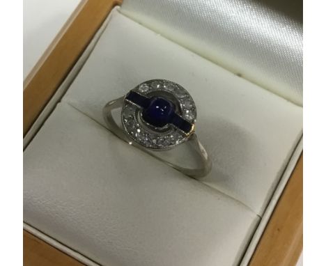 An Art Deco sapphire and diamond cluster cocktail ring