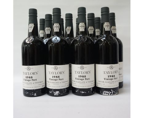 TAYLOR'S 1985 VINTAGE PORT
A case of twelve bottles of Taylor's 1985 Vintage Port.  75cl.  20.5% abv.  "The Vintage of 1985 w