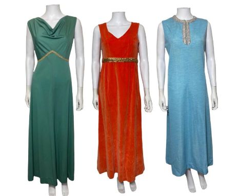 A collection of 60s and 70s clothing including a brown and white maxi dress with tie belt by Kati (Laura Phillips), a black e
