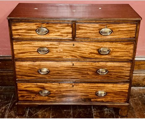 A Regency period mahogany chest of drawers, circa 1815, rectangular form fluted edge, above two short over three long drawers