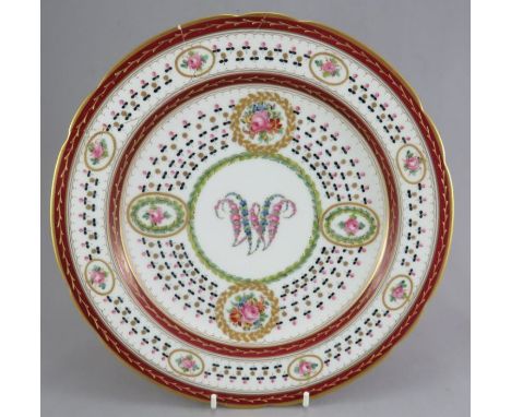 A nineteenth century superb quality hand-painted German Carl Magnus Hohenberg porcelain plate with raised gilding and a centr